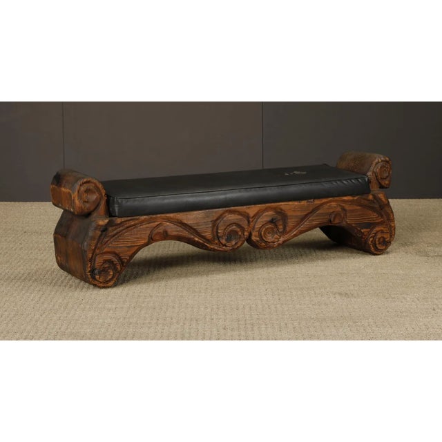 Striking vintage carved bench by Witco, a maker well known for its bold Polynesian and tiki-inspired furniture during the...