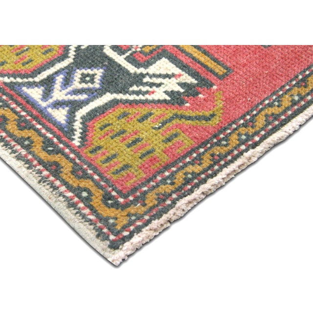 Hand-woven vintage Turkish Oushak yastik crafted with wool on wool in Western Turkey's storied weaving region. Measuring...