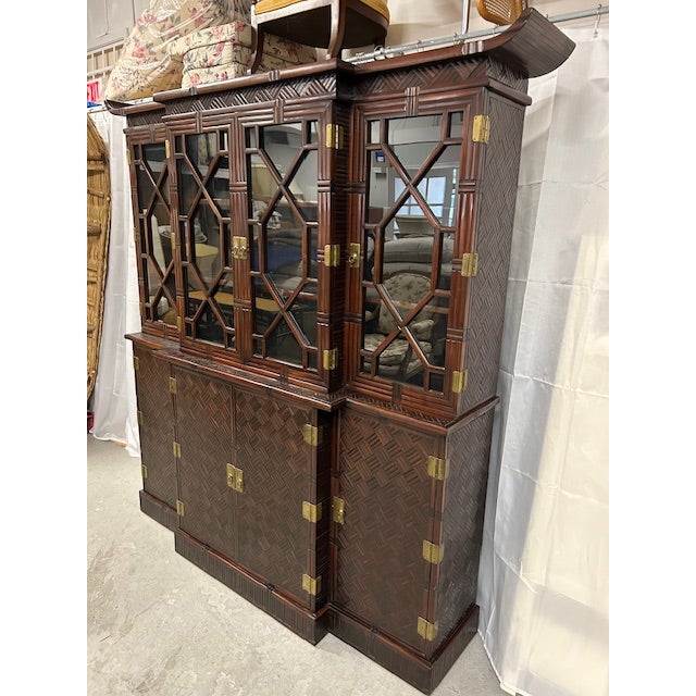 Beautiful 1950s faux bamboo split rattan pagoda cabinet ready to stand center in your space. Nice petit size that would...
