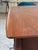 Vintage Danish modern walnut writing desk, featuring tapered legs, one filing drawer and two smaller drawers that all move...