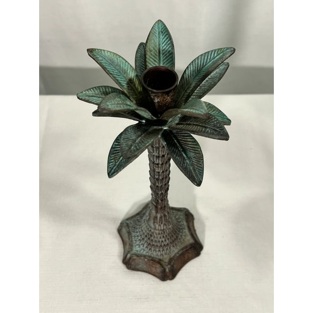 Welcome to Turtle and Crane! This Vintage Palm Beach Regency Palm Tree Candlestick Holder is a true beauty. Standing at...