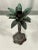 Welcome to Turtle and Crane! This Vintage Palm Beach Regency Palm Tree Candlestick Holder is a true beauty. Standing at...