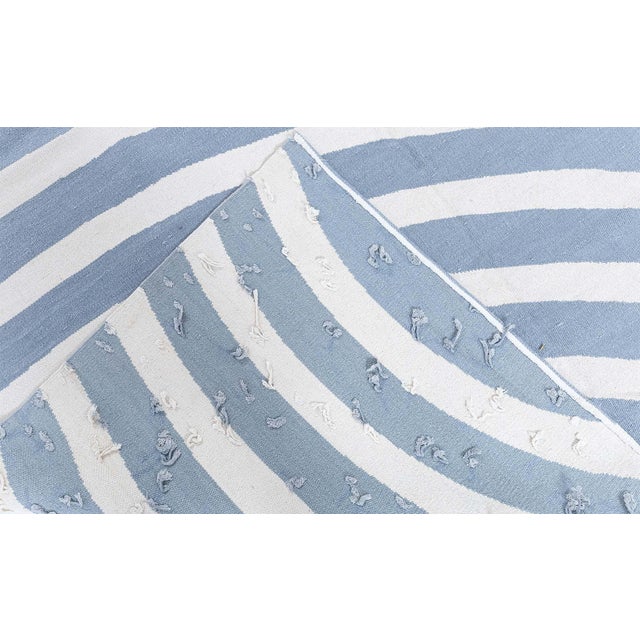 Evoking the quiet poetry of contour lines undulating across a sun-washed landscape, Berber Hills by Kim Alexandriuk offers...