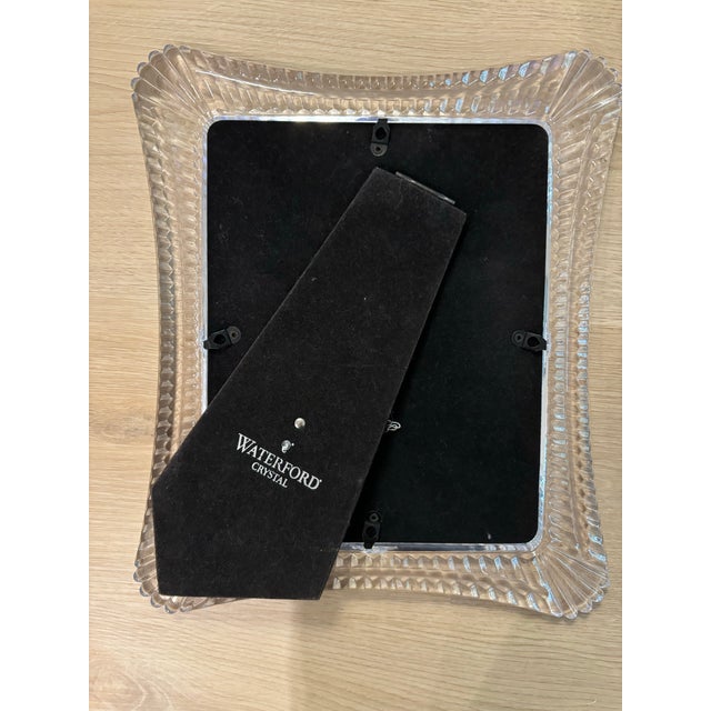 8x10 Waterford Crystal frame. Includes original storage bag. Excellent condition.