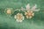 Hand-knotted in wool, this 4x6 contemporary Chinese Deco rug showcases a radiant jade-green field enclosed by sculpted...