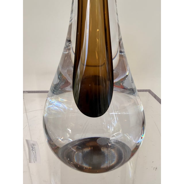 Elevate your décor with this contemporary deep olive green decorative vase, featuring a sleek elongated silhouette and...