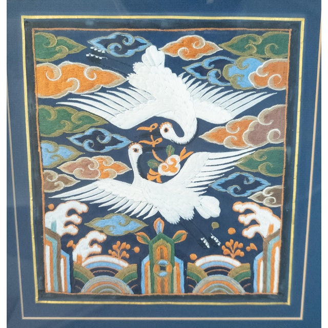 We are selling this well framed Korean rank badge. This badge or Hyungbae features two opposed white cranes in flight...