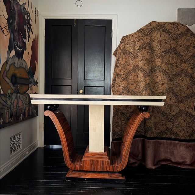 An Art Deco style console table in multi-materials.