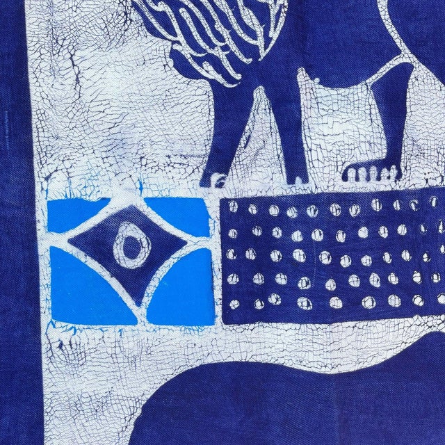 Each table runner is meticulously crafted using the ancient technique of batik, where intricate patterns are carefully...