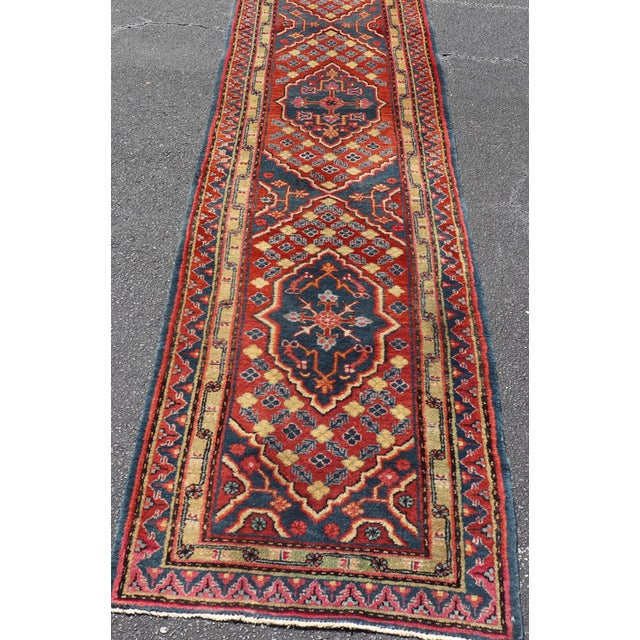 Terra Cotta Antique Khotan Runner in Deep Indigo, Rust Red, and Soft Yellow Tones For Sale - Image 8 of 14