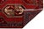 Elevate your interior with this striking hand-knotted Caucasian Kazak wool runner. Characterized by its vibrant crimson...