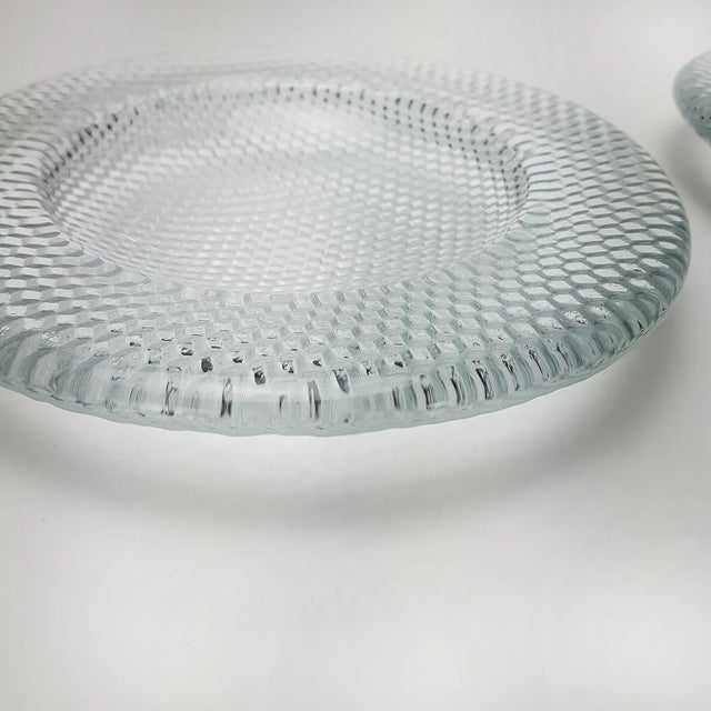 Beautiful sparkling candleholder by Holmegaard in Denmark, 1988. Step like indented pattern creates a mesmerizing optical...