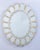 This beautiful oval shaped Venetian mirror features etched floral motifs adorning the mirrored frame. Along the edges of...
