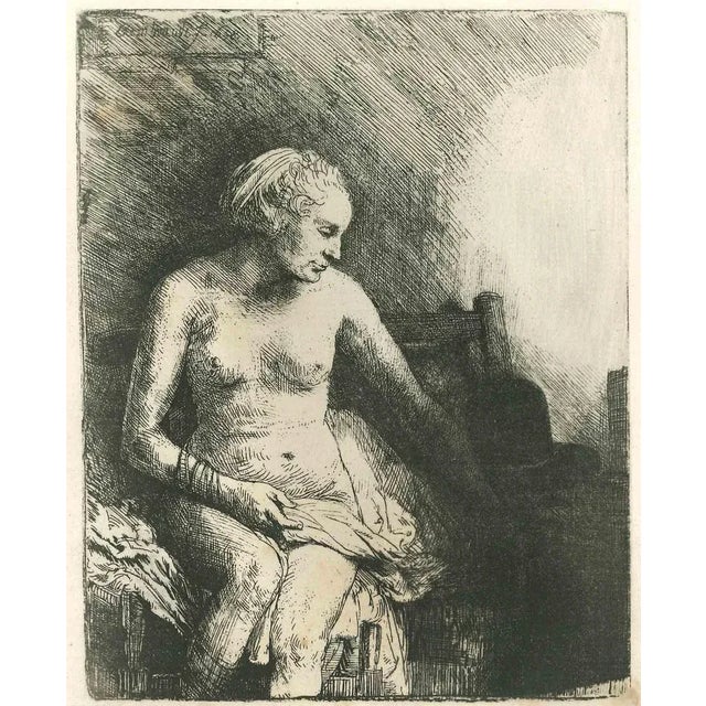 Woman in the Bathroom I is an engraving on ivory-colored paper realized by Charles Amand Durand after an etching by...