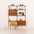 This teak wall unit with a desk-shelf was designed by poul cadovius for cado in the 1960s. Its simple form provides...