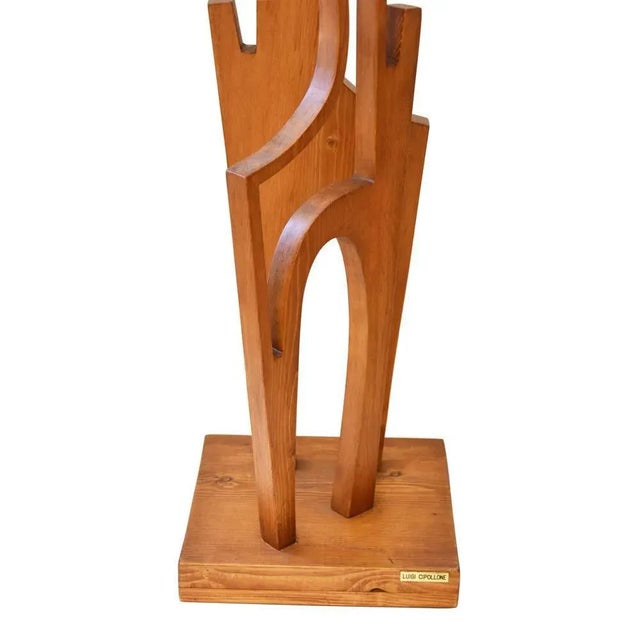 A tall wooden sculpture. 1960’s Roman school design by Luigi Cipollone. This piece has an attribution mark, I am sure that...