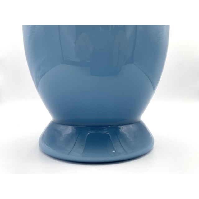 Idalion vase in light blue, designed by Alessandro Mendini and produced by Venini. This piece of art is part of a triptych...