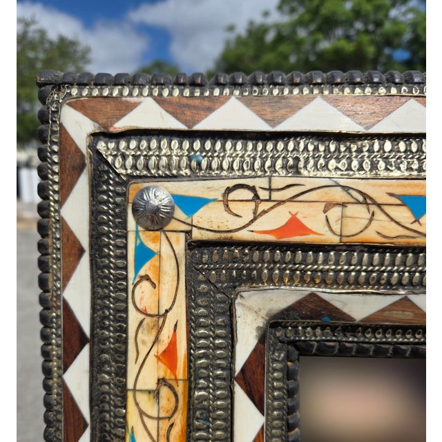 Imagine a striking focal point for your space – a very large, full-length Moroccan mirror, meticulously handcrafted from...