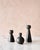 A sculptural trio of handmade ceramic candle holders by Lostine, featuring the brand's sought-after Bella, Beau, and Bobbi...