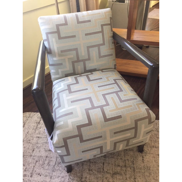 Pair of modern wood arm occasional chairs. Blue-green and gray geometric upholstery fabric. Dark gray "smoke" wood finish.