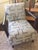 Pair of modern wood arm occasional chairs. Blue-green and gray geometric upholstery fabric. Dark gray "smoke" wood finish.