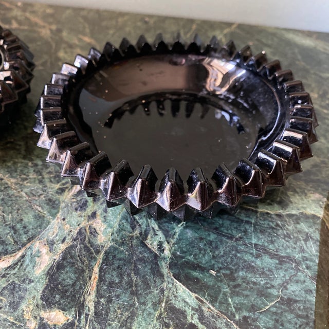 Add a pop of black color to your space! These vintage ashtrays have stood the test of time.