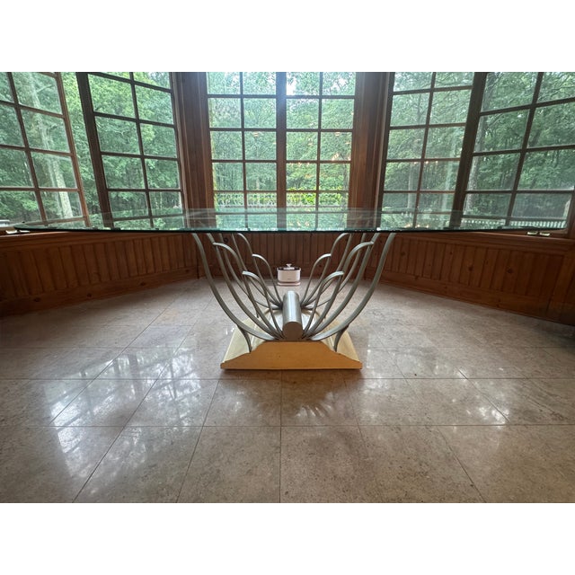 For sale is a stunning, sculptural Art Deco style "Butterfly" dining table. This unique mid-century statement piece...