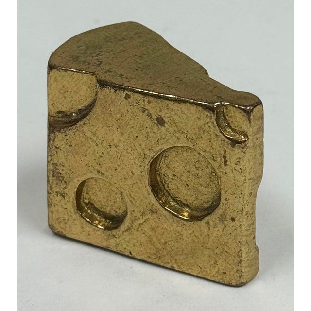 Whimsical vintage brass paper weight with cheese wedge motif. Charm and function! Marked Royal Canadian Brass. Patina.