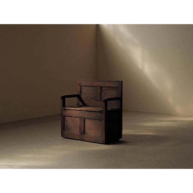 19th-century solid wood bench chest from the Cantal, Auvergne. Designed for rural interiors around the traditional...