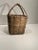 A French market basket, often referred to as a "panier" in French, is a traditional woven basket typically used for...