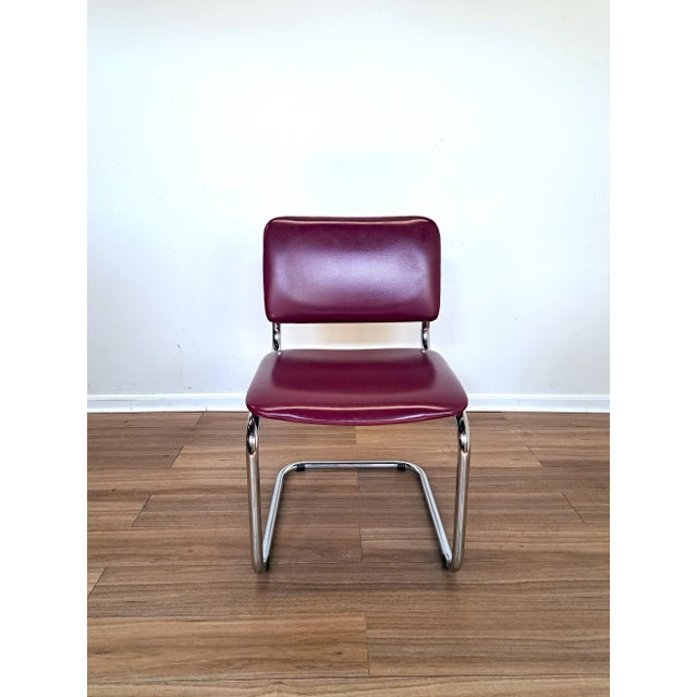 Clean survivor from the 70s in great shape.Great as a dining chair with other mixed, iconic chairs or as a desk chair.