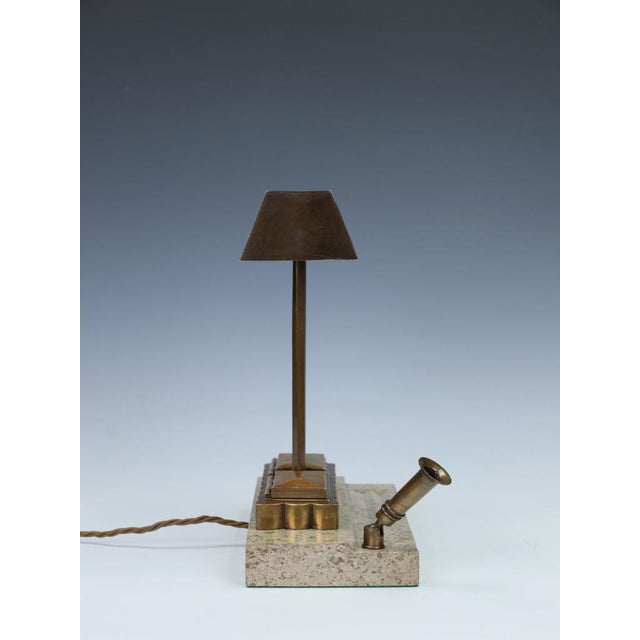 Art Deco Bronze Desk Lamp with Fossiliferous Limestone Base, 1930s, in Very Good conditions. Designed 1920 to 1949 This...