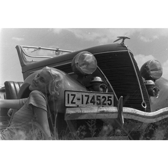 Germany, 1937 – Photograph by Peter Cornelius In this expressive low-angle portrait by Peter Cornelius, taken in 1937, a...