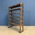 Old wooden rack originating from a shoemaker's workshop in Nijmegen, circa 1920. The wooden rack is mobile thanks to the...