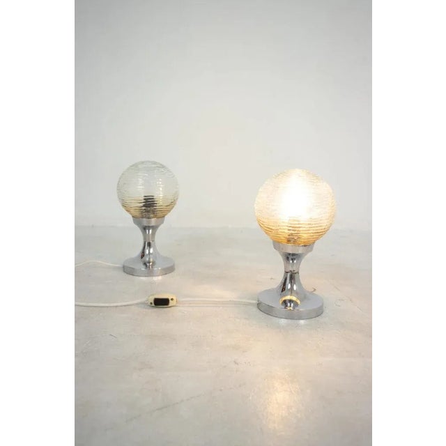 Chrome Table Lamps, 1970s, Set of 2, in Flawless conditions. Designed 1970 to 1979 European Plug (up to 250V).The wiring...