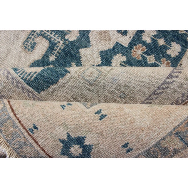 Bold Design Blue and Cream Turkish Oushak With Stretched Medallion For Sale - Image 9 of 11