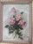 A charming signed oil on canvas depicting a bouquet of delicate pink roses against a softly rendered neutral background....