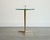 Elegant and refined, this Italian brass side table captures the spirit of mid-century design, reminiscent of the work of...