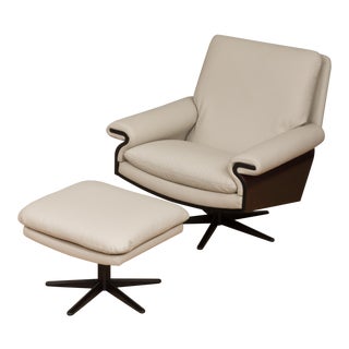 Mid-Century Modern Leather Swivel Lounge Chair With a Footstool For Sale