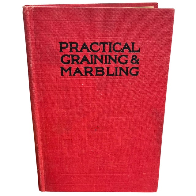 A striking and highly decorative 1920s hardcover edition of Practical Graining & Marbling by F. Maire, featuring an...