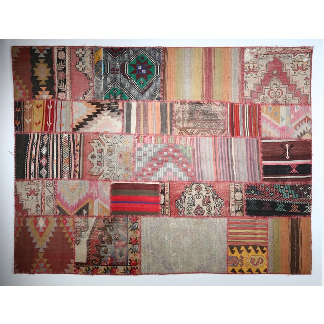 Vintage Kilim Patchwork Rug – A Modern Mosaic of Heritage This striking patchwork rug is a curated collage of handwoven...