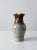 This is a vintage Charlotte Wall studio pottery pitcher dated 1980. The hand-crafted ceramic ewer has a beautiful gray...