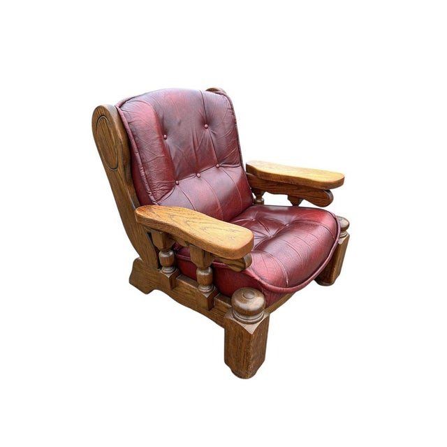 Large Dutch lounge chair made of oak with red leather removable cushions, period 1970s, Brutalist or Colonial style....