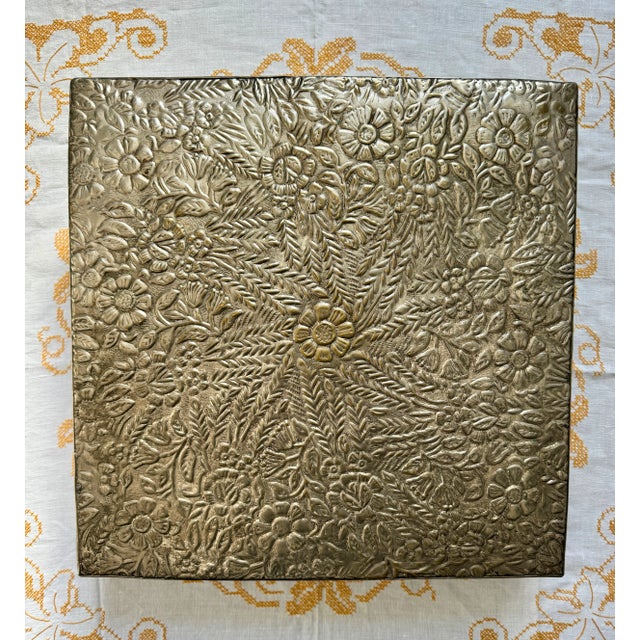 Beautiful, large, brass stand with floral motif and fluted detail on sides. Perhaps originally used as a Chowki or as a...