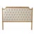 Tufted queen headboard upholstered in natural linen on natural oak.