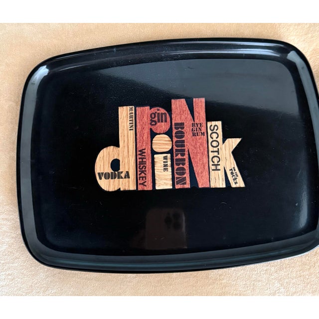 What attracted me to this tray is the whimsical intricate "drink" motif. Skilled artisans hand positioned each piece of...