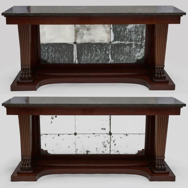 This superb matched pair of Neoclassical or American Empire Style console tables exemplifies the refined neoclassicism...