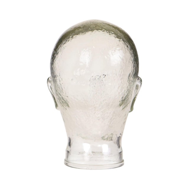 Cool and heavy vintage display head, mannequin head, made out of transparent pressed glass with non-slip texture on the...
