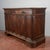 Two-door sideboard richly decorated with frames in the style of a 20th-century italian sacristy, made of solid wood and...