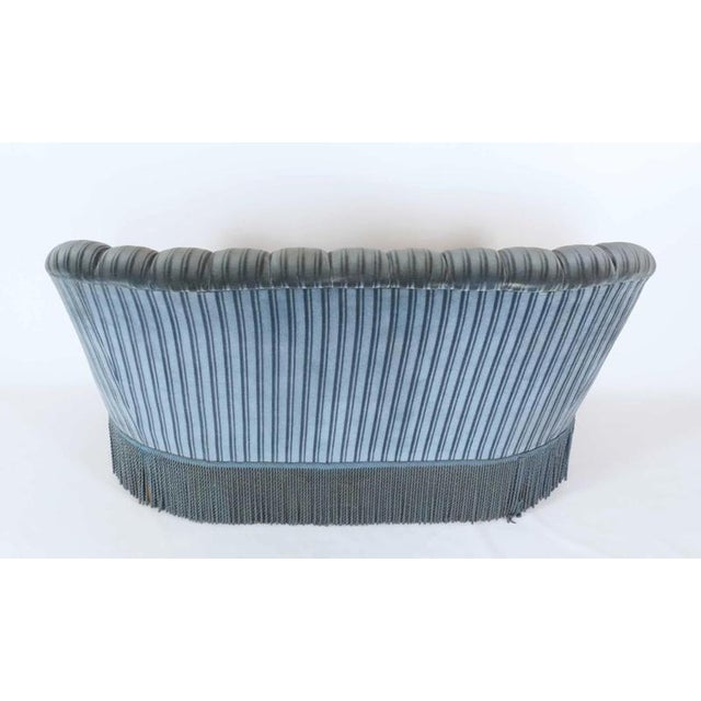 English Victorian style sofa made of blue mohair with fringes. The sofa is very comfortable. The seats are loose. Armrests...